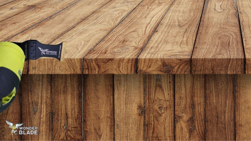 Oscillating tool cutting hardwood surface with precision Wonder Blade.